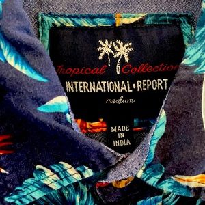 Hawaiian shirt.  Shirt sleeve medium.